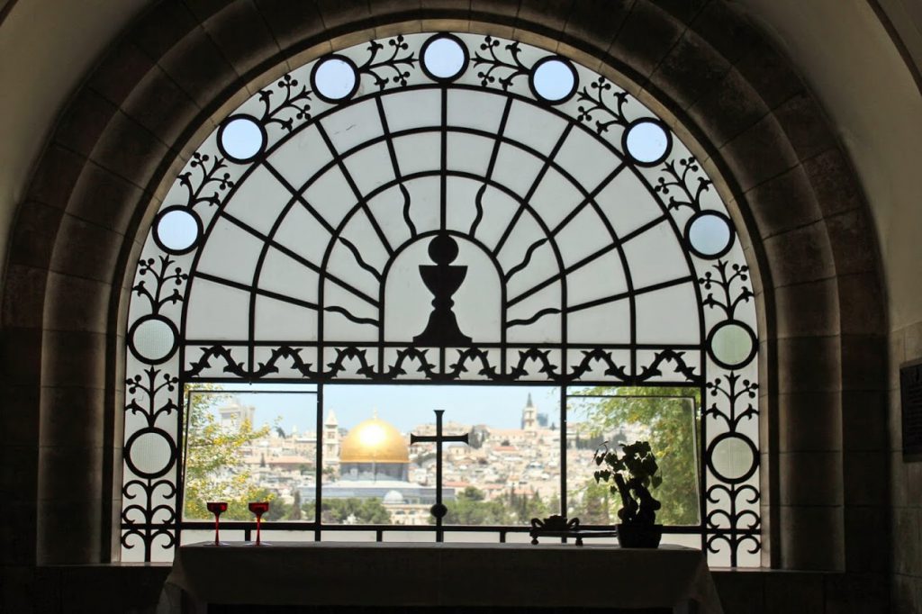 Looking out to the Dome of the Rock through church windows on the Mt. of Olives.